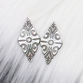 Diamond-shaped black shell pendants with intricate leaf engravings and iridescent finish - Diamond