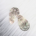 Pair of natural mother-of-pearl teardrop pendants with tribal geometric engravings - Teardrop