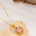 Collier en acier titane doré avec pendentif trèfle rose rotatif et pavé de cristaux - Collier Pendentif Trèfle Zircon Rose