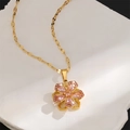 Close-up of pink zircon five-leaf flower pendant on gold-plated stainless steel chain - Pink Zirconia Flower Pendant Necklace