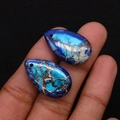 Detail view of two blue teardrop semi-precious stone pendants for DIY jewelry crafting - Pendant Only (No Chain) / 15x25mm 3g/Item / Blue Brown Vein (No.7)