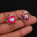 Macro shot of apple-shaped natural stone connectors with gold plating for jewelry making - 18x21mm / Pink (Color 1)