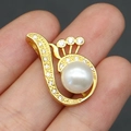 Detailed close-up of a golden peacock wing pendant featuring white pearl and zircon accents - White Artificial Pearl Pendant (Pendant Only) / 14x24mm / White