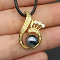 Detailed shot of peacock wing pendant with dark grey pearl and diamond accents - Black Artificial Pearl Necklace (With Black Cord) / 14x24mm / Black