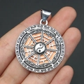 Detailed view of a silver alloy circular Bagua pendant with colored shell inlay details - 29x39mm / Pendant 8
