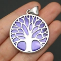 Macro shot of silver Tree of Life pendant with purple sea shell inlay held by hand - Style 5 (Pendant Only)