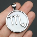 Silver Scorpio constellation charm with natural white shell inlay in round pendant - 32x37mm / Scorpio