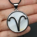 Silver round Aries zodiac pendant with white shell inlay on a black braided cord - Aries (With Necklace Cord) / White/Silver
