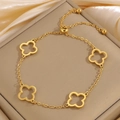 Bracelet trèfle doré ajustable avec des éléments évidés et un fermoir coulissant - Bracelet trèfle évidé doré