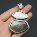 Detailed view of an alloy abalone shell pendant featuring white and grey mother of pearl - Black Gray Mother Of Pearl Style (No. 3)