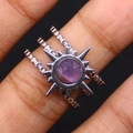 Detail of silver stainless steel triple band ring with purple gemstone sunburst - Purple Crystal
