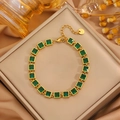 Detailed close-up of gold stainless steel bracelet featuring square green zircon stones - Gold Square Green Zirconia Bracelet