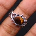Vintage roestvrijstalen ring met ovale tijgeroogsteen en stralend zonnebloemontwerp - Tijgeroog