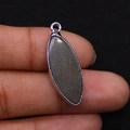 Marquise shaped natural stone pendant with silver plated bezel and dark grey matte finish - Hematite
