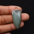 Detailed view of faceted green stone arrowhead pendant with gold-plated metal border - 16x38mm / Green (2#)
