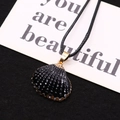 Elegant black shell pendant with gold plated edges on a thin black cord necklace - Glossy Black Style (No. 4)