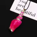 Detailed close-up of bright pink seashell pendant with gold-plated edges on black rope - 20-60mm / Bright Pink (Without Rope)