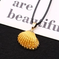 Gold plated scallop shell pendant with radial texture on a black braided cord necklace - Gold Metal Style (Size 6)