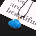 Blue seashell pendant with gold-plated edges on a black cord necklace for women - Royal Blue Style (10)