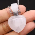 Macro shot of heart-shaped rose quartz perfume bottle pendant with a silver metal chain - 23x36mm, 15g / White Crystal
