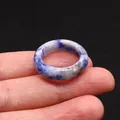 Polished blue and white natural sodalite stone ring with unique marbled pattern texture - Blue Spot Stone