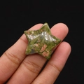 Polished star shaped unakite natural stone bead held in hand for size visualization - 30mm (Thickness 8mm) / Unakite