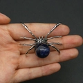 Spider pendant in silver finish featuring a spherical blue natural stone inlay - 34x47mm, 14g / Blue Sodalite