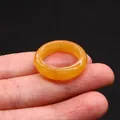 Minimalist translucent orange agate stone ring with a polished round band finish - Red Agate