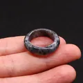 Polished natural labradorite stone ring with unique grey and black mineral patterns - Larvikite
