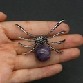 Creative spider-shaped pendant featuring a polished purple stone and silver metal legs - 34x47mm, 14g / Purple Crystal