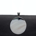 Natural round freshwater shell pendant with silver metal bail on a black jewelry stand - 60mm / No.2 Round Disc Style (1014-B210215013)