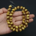 Close-up of yellow tiger eye glass beads with cat-eye effect for jewelry DIY making - No. 6 (Yellow Tiger Eye)