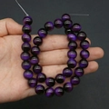 Macro shot of 10mm purple cat eye glass beads for DIY jewelry making and craft projects - 8mm / No.3 Purple
