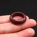 Red jasper natural stone ring with dark marbled texture on finger in high-gloss finish - Red Unakite