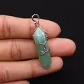 Close-up of handmade copper wire-wrapped natural green stone hexagonal prism pendant - 10x40mm / Green Aventurine