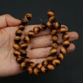 Polished golden brown tiger eye glass beads for DIY necklaces and bracelets - 8mm / No. 2 (Yellow Tiger Eye)