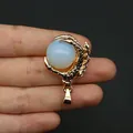 Golden dragon claw pendant featuring a translucent opal stone sphere for DIY necklaces - Opal