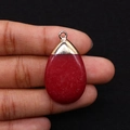 Detail of tear-drop shaped red agate pendant with a polished golden metallic bail - Red Carnelian (Gold Cap) / Dark Red