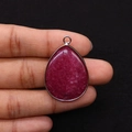 Detailed view of teardrop dyed stone pendant with silver plated edge held by hand - 21x35mm(8g/pc) / No.2 (Rose Red)