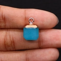 Detail of square faceted blue gemstone pendant with rose gold bail held by hand - 10x15mm 3g Per Piece / Blue Stone (No.5)