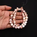 Macro detail of star-shaped natural stone beads with red marble texture for DIY jewelry - 10x10mm (4mm Thickness) / White with Red Brown Vein (No. 16)