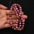 Detail of round imperial stone beads in purple and pink marble texture for DIY jewelry - Pink Purple Mixed
