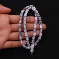 Macro shot of blue bone-shaped beads with marbled texture for DIY jewelry making - Grey Blue Marble Texture (No.2)