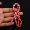 Macro shot of bow-shaped pink marble emperor stone loose beads for DIY jewelry making - Pink Marble Texture (No.1)