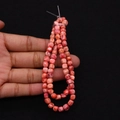 Dettaglio di perline a botte in pietra imperiale arancione con trama marmorea per gioielli - 5mm / Rosso arancio con trama rossa e bianca (N. 12)