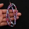 Colorful cylindrical emperor stone beads strand with vibrant magenta and blue marble texture - 4x8mm / Size 9