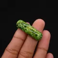 Close-up of polished green imperial stone pendant with natural marbled texture - Cylindrical Curved Style / No. 12 (Green White Marbled)