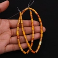 Polished cylindrical orange emperor stone beads for DIY jewelry making and crafting - 4x8mm / Size 12