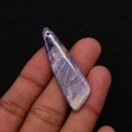 Close-up of purple emperor stone pendant showing its unique natural fibrous texture - 13x45mm / Purple Cloud Texture