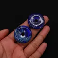 Macro detail of polished dark blue emperor stone donut pendants with natural texture - No.3 (Dark Blue Marble) / 30mm